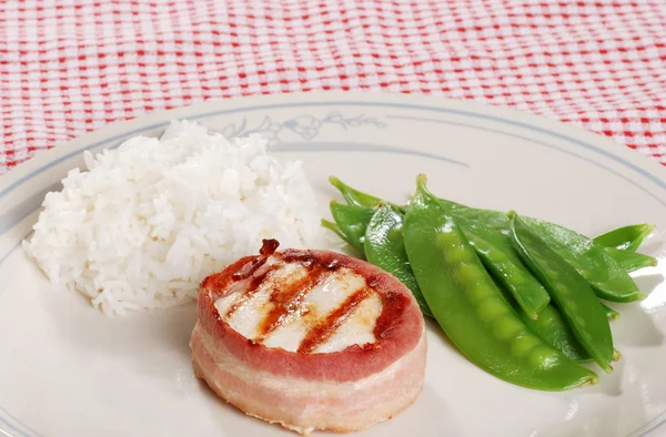 Bacon wrapped chicken with snow peas