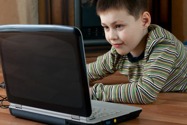 Boy playing computer game