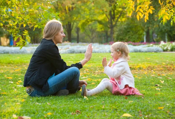 Mother and daughter in the park