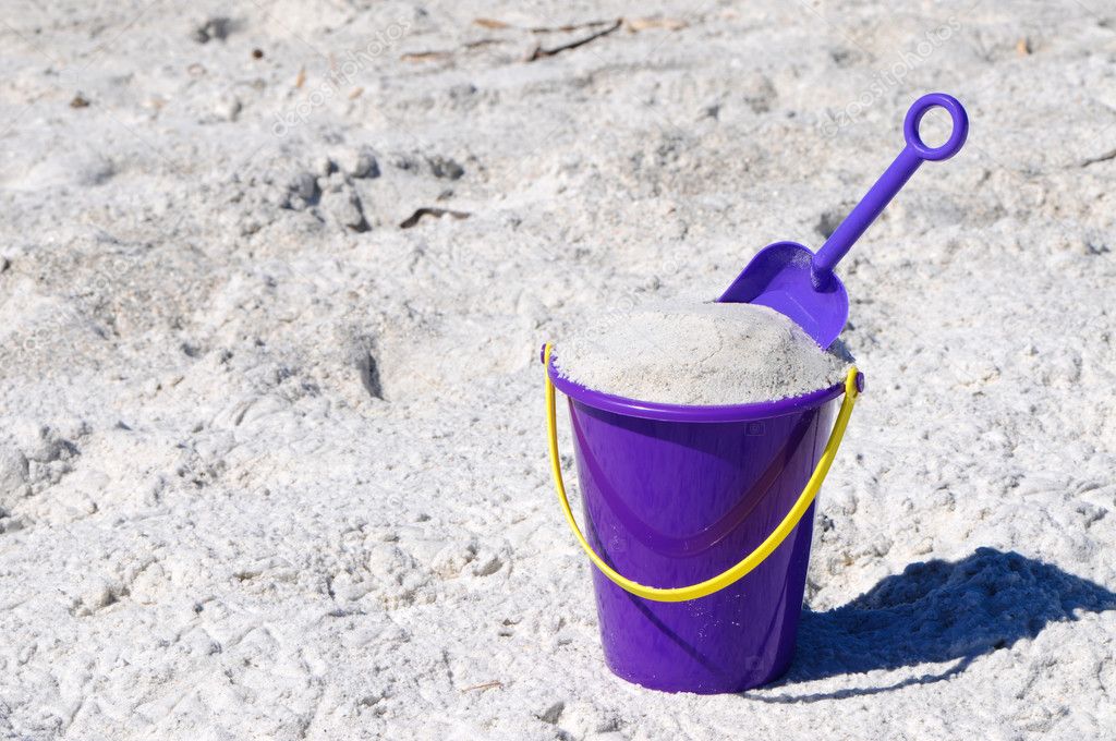 Beach Bucket with Shovel — Stock Photo © EyeMark 2559497