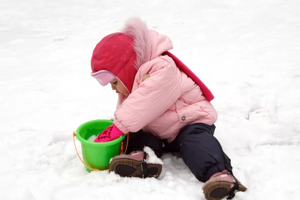 Little Baby Playing with Snow