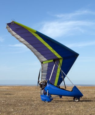 Blue hang-glider clipart
