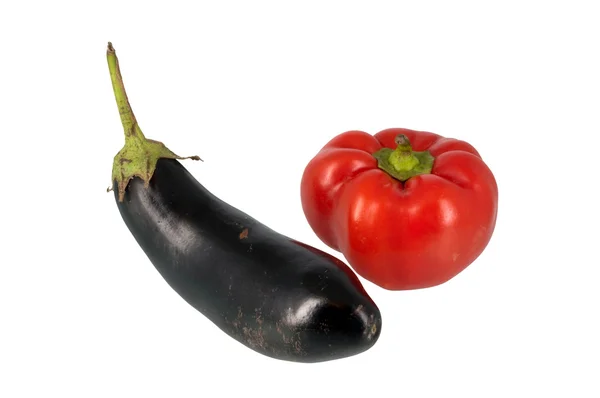 Red sweet pepper and black eggplant — Stock Photo, Image