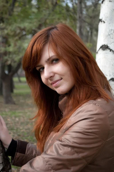 Portrait of a young red-haired girl — Stock Photo, Image