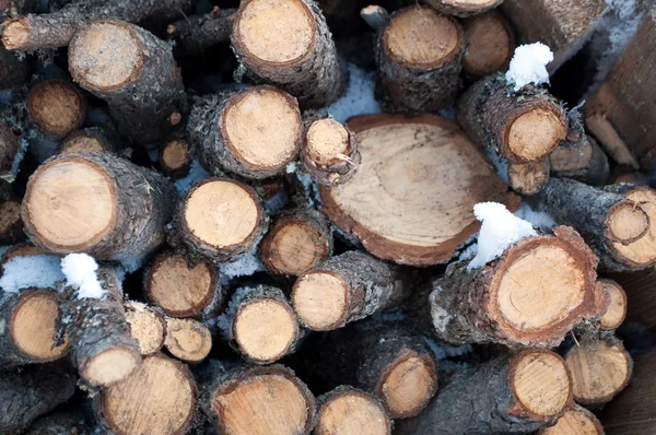 Holzstapel-Hintergrund Stockbild