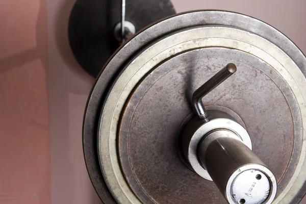 close up view of a vintage bell in a gym 