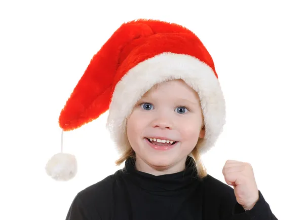 Barnet i en hatt jultomten — Stockfoto