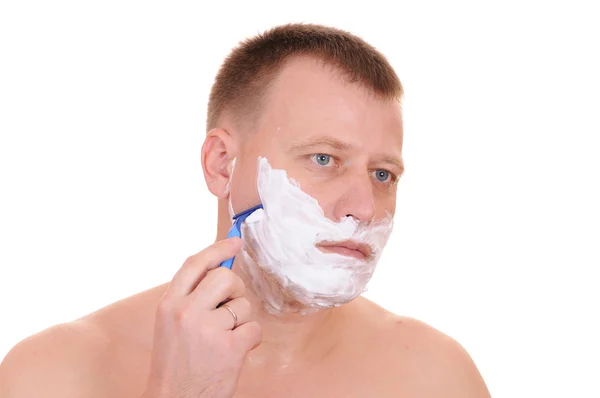 Człowiek na golenie — Zdjęcie stockowe