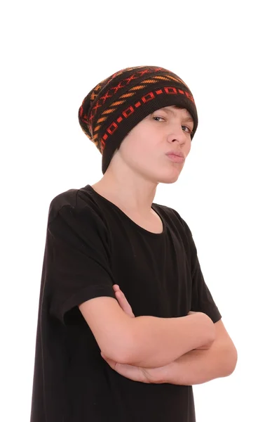 O adolescente em um colete preto e um chapéu — Fotografia de Stock