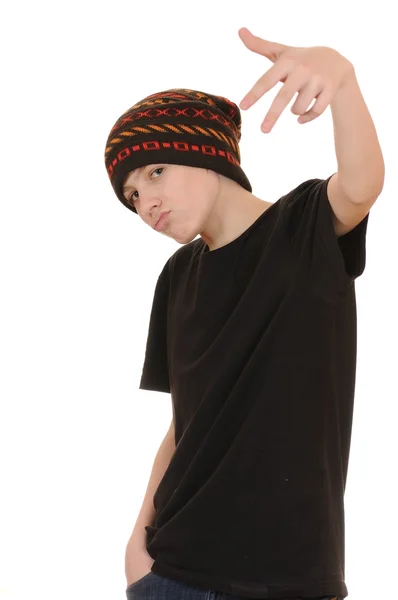 Der Teenager in schwarzer Weste und Hut — Stockfoto