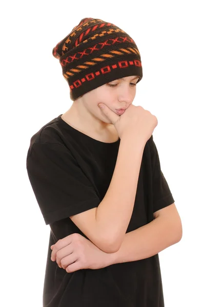Tonåring i en svart väst och en hatt — Stockfoto