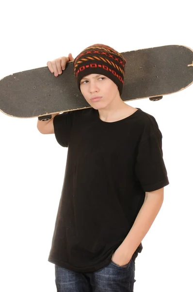 Tonåringen med en skateboard — Stockfoto