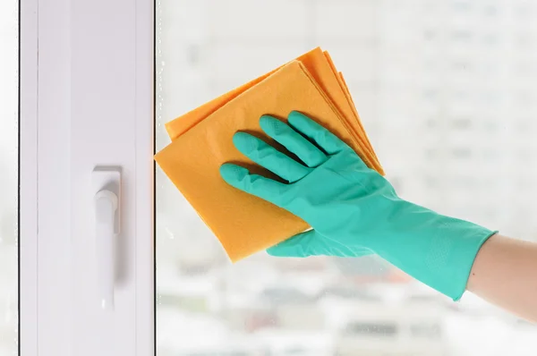 Hand in a green glove — Stock Photo, Image