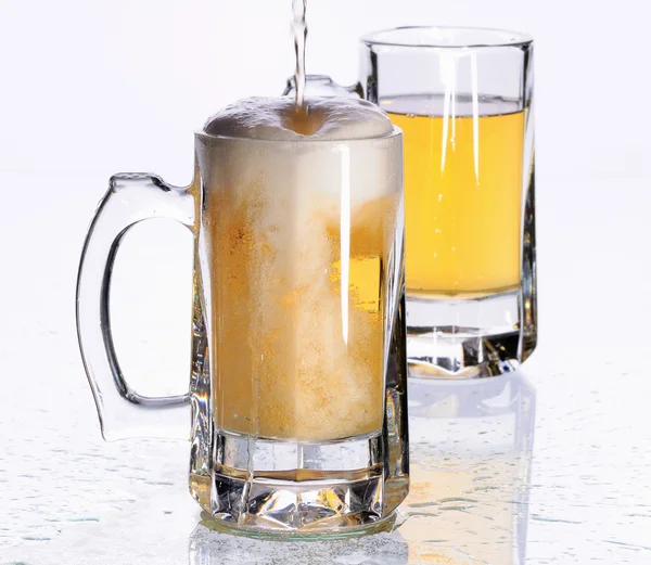 Mugs with beer — Stock Photo, Image