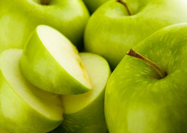 green apples closeup on a white background 