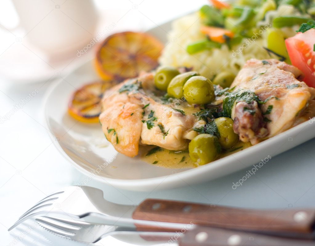 baked salmon and rice with vegetables and herbs 