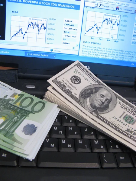 Cash money és finansial grafika — Stock Fotó