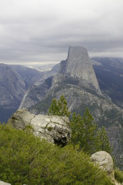 View to Half Dome Pick and waterfalls clipart