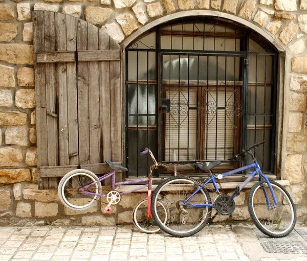 Old bikes in old street... — Stock Photo, Image