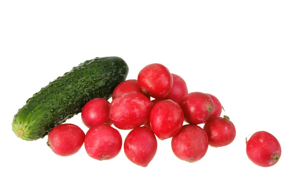 Um pepino verde e um grupo de gard vermelho — Fotografia de Stock
