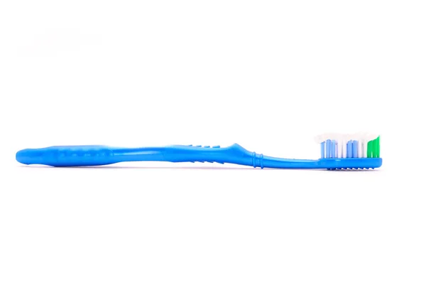 Cepillo dental blanco azul —  Fotos de Stock