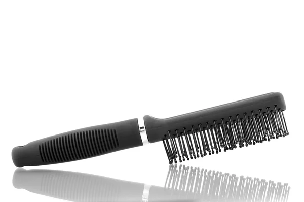 Black hairbrush isolated on white bacgro — Stock Photo, Image