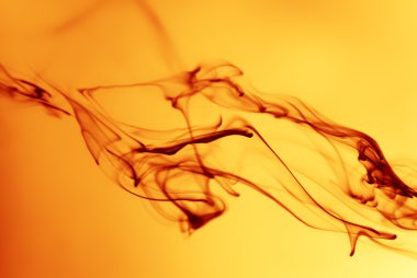 abstract red smoke on white background from the incense stick 