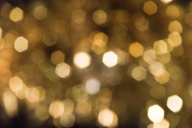 abstract golden bokeh on black background  clipart