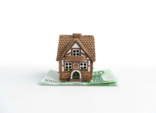 Model House Coins White Background — стоковое фото