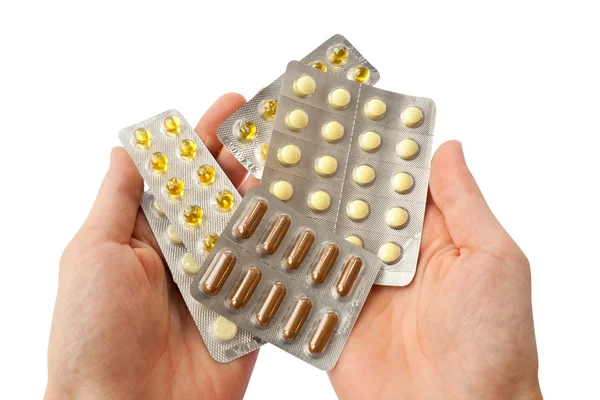 Tabletter i händer — Stockfoto