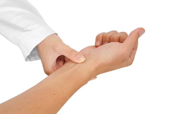Doctor measures pulse — Stock Photo, Image