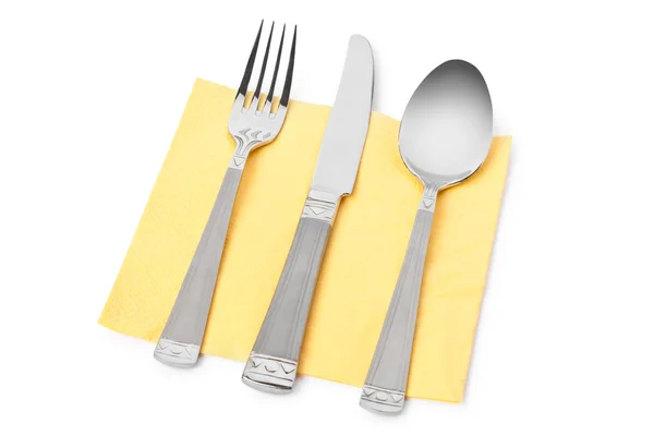 Fork, knife and spoon on table-napkin — Stock Photo, Image