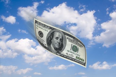 Flying money in the sky clipart