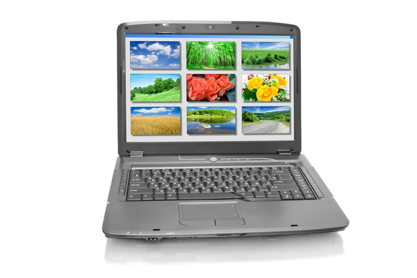 Laptop com fotos da natureza — Fotografia de Stock