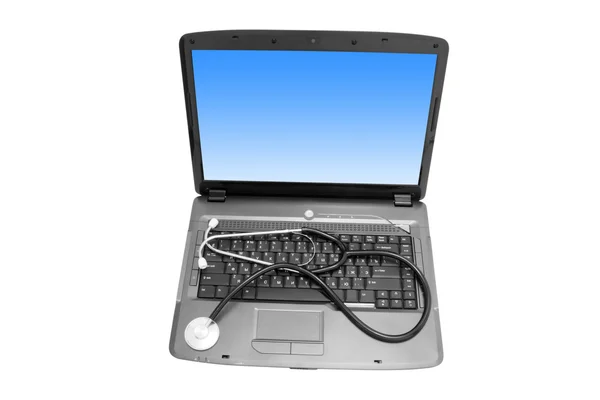 Estetoscópio com laptop — Fotografia de Stock