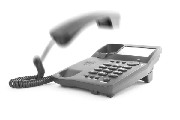 Telefone de escritório com o auscultador em movimento — Fotografia de Stock