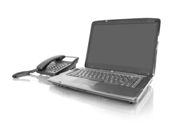 Workplace. laptop with telephone — Stock Photo, Image