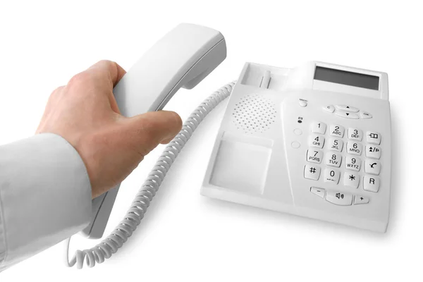 Telephone receiver in hand — Stock Photo, Image