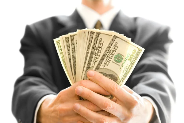 Money in hand of businessman — Stock Photo, Image