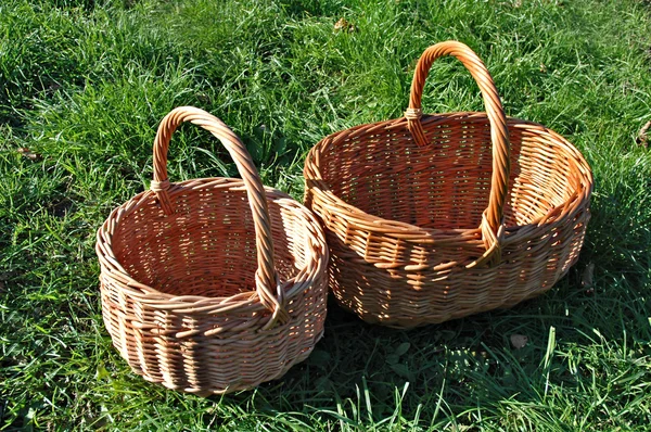 Empty baskets on a grass