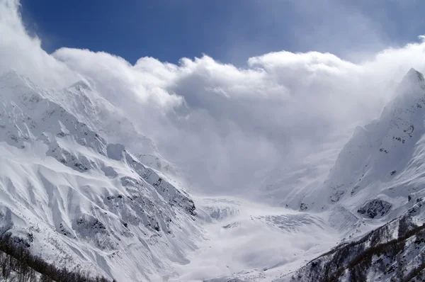 stock image Sunny mountain in clouds