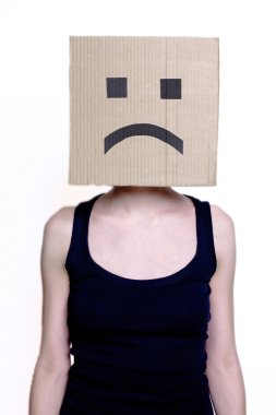 Girl in cardboard mask with sad smile clipart