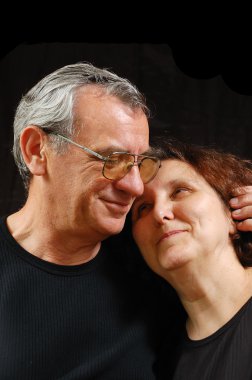 senior couple portrait isolated on black  clipart