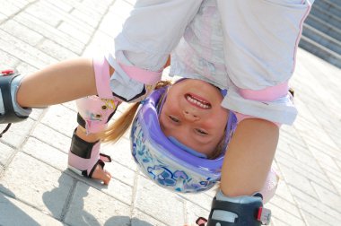 little girl on roller skates  clipart