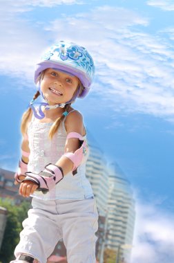 girl in helmet with roller skates  clipart