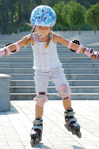 Riding on roller blades Stock Photo