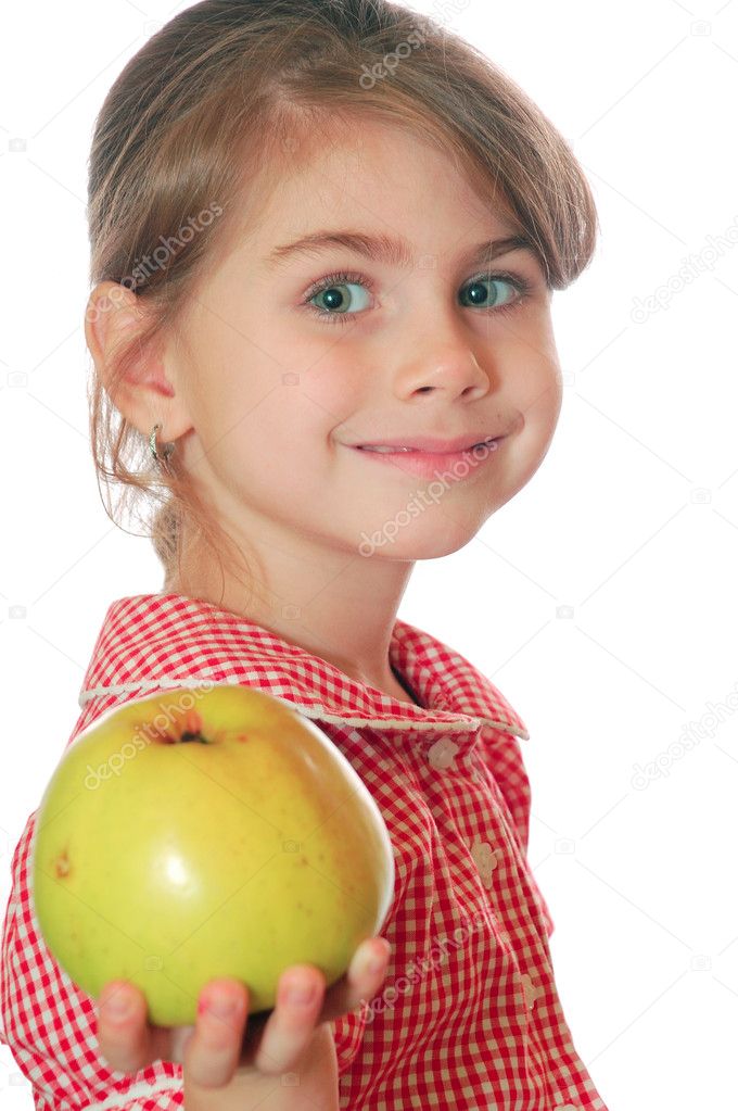 little girl eating an apple, isolated on white 