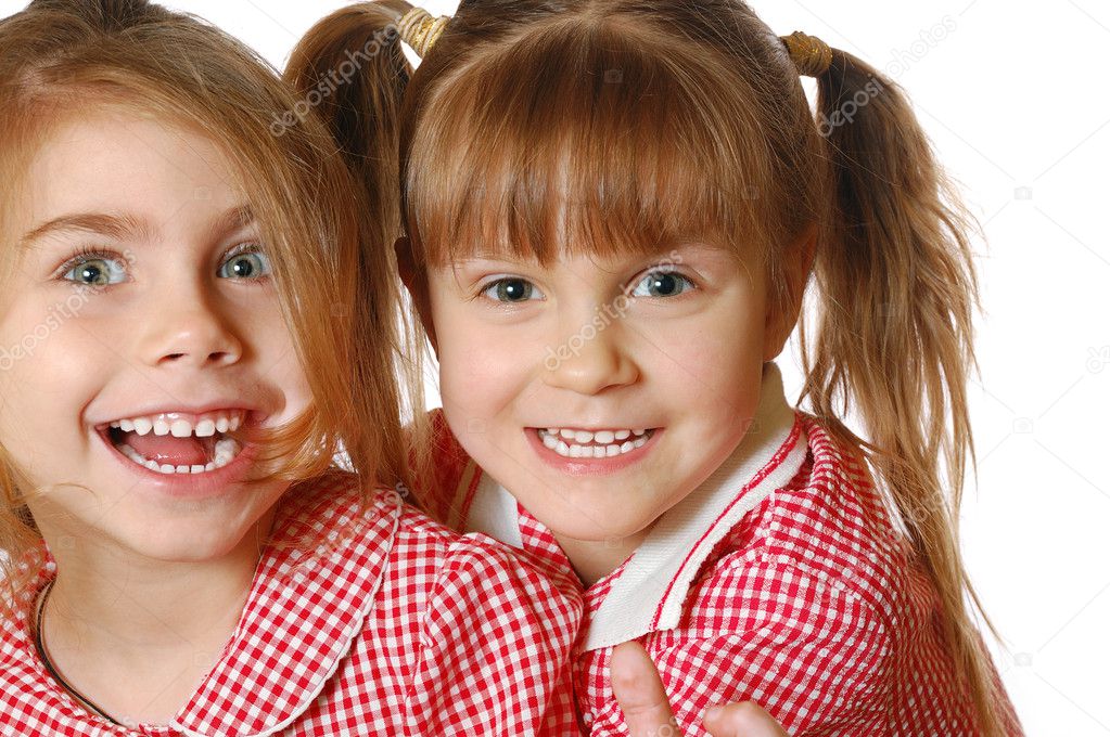 portrait of two happy little girls 