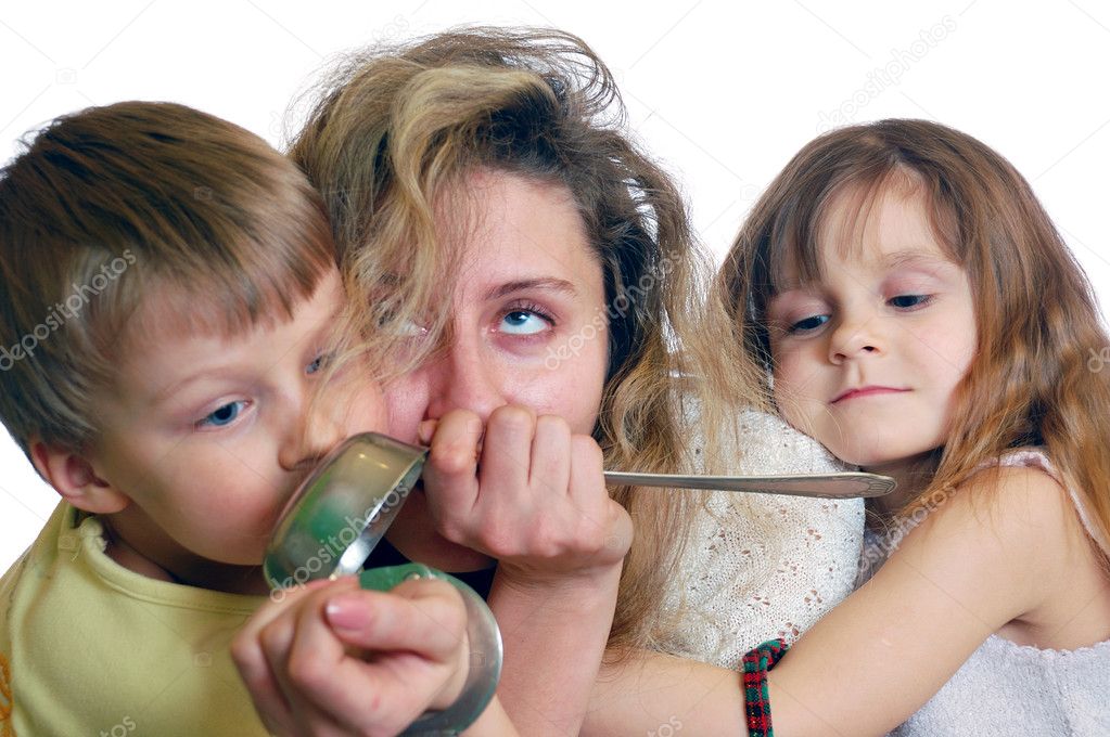 mother and daughter with magnifying glass on a white backgroun 
