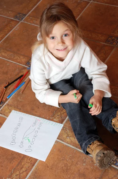 stock image Little girl drawing a house